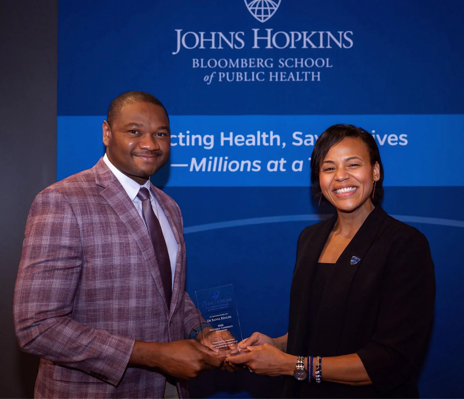 Dr Banda Khalifa receiving recognition at the Johns Hopkins Bloomberg School of Public Health